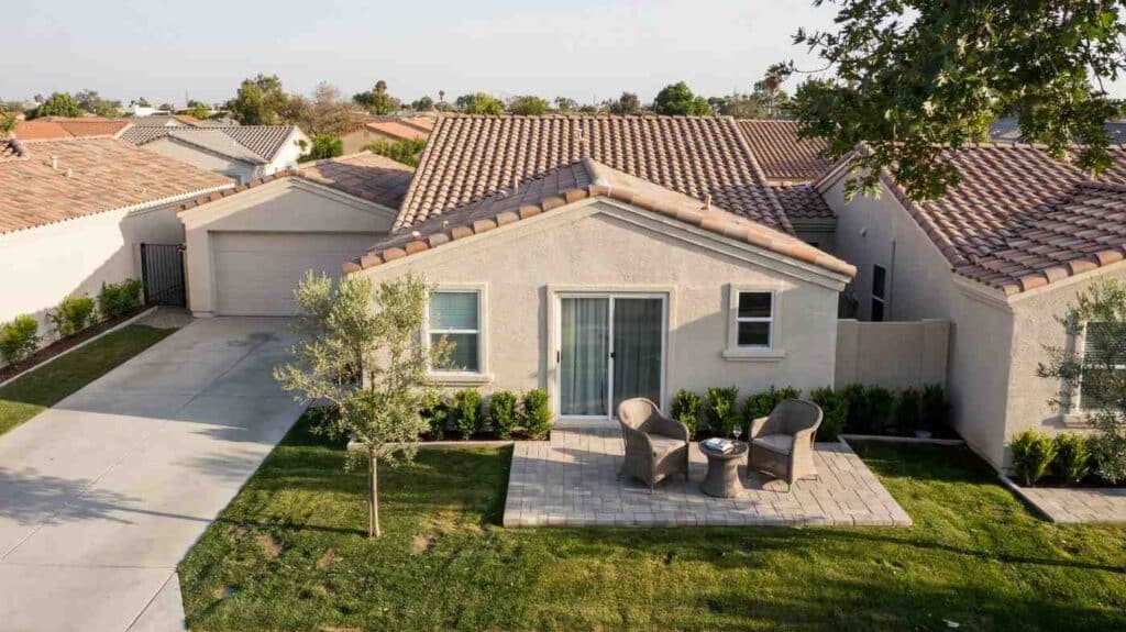 Single-story patio home with a shared wall and small private patio out front